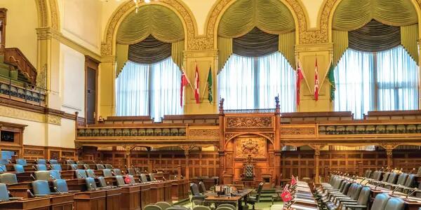 The interior of the Ontario Legislature. It is empty.
