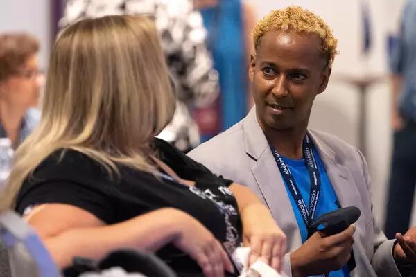 One member talking emphatically to another