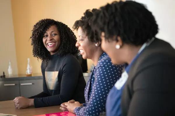 Group of people talking in an office