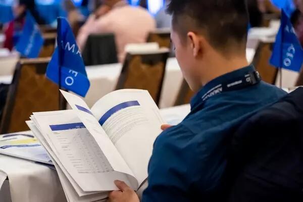 A member reading an AMAPCEO pamphlet