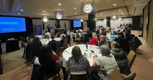 Members gathered in a conference room for the spring 2023 ALF