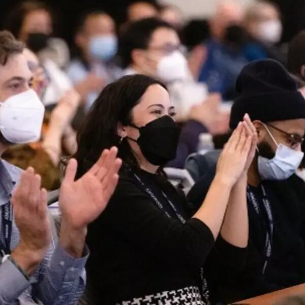 image of AMAPCEO members clapping at conference