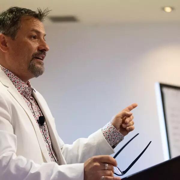 Claudio Pevide presenting in a meeting