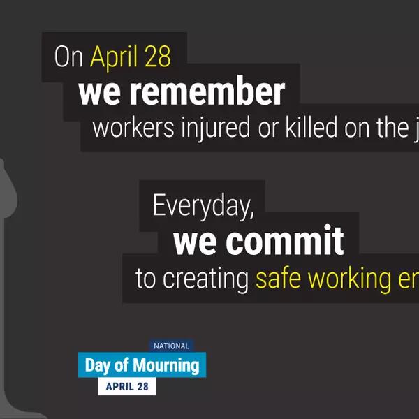 Poster with burning candle and text "we remember workers injured or killed on the job"