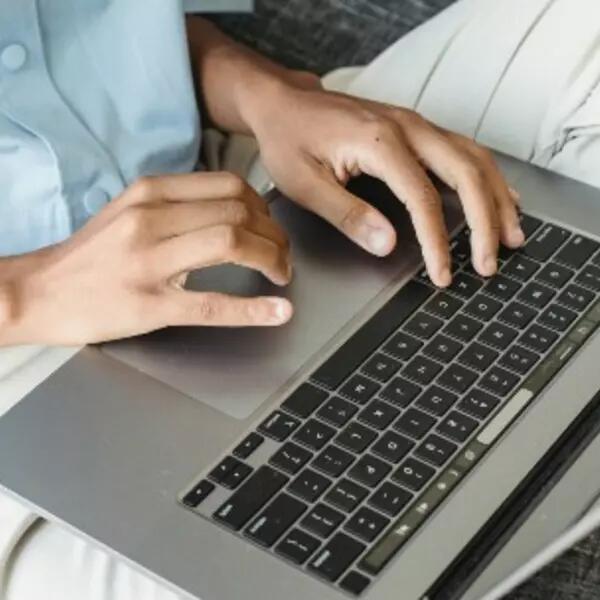 image of person working on a laptop