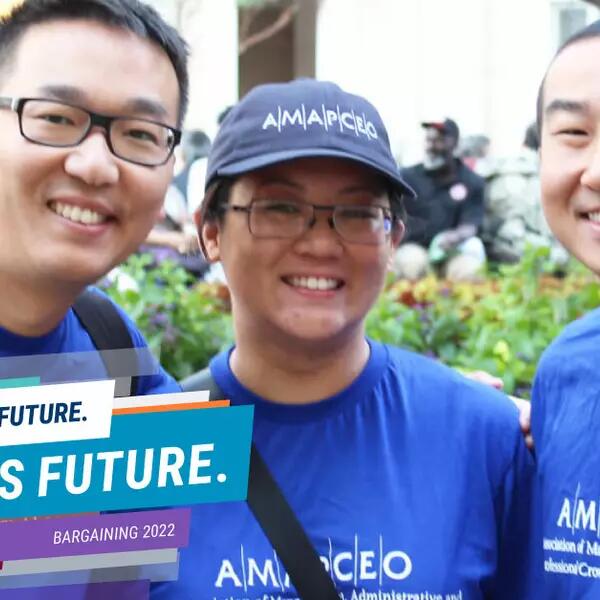 Photo of smiling AMAPCEO members wearing navy