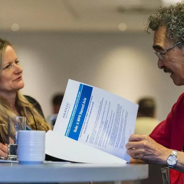 Two Workplace Representatives speaking at the 2023 Workplace Representatives' Conference